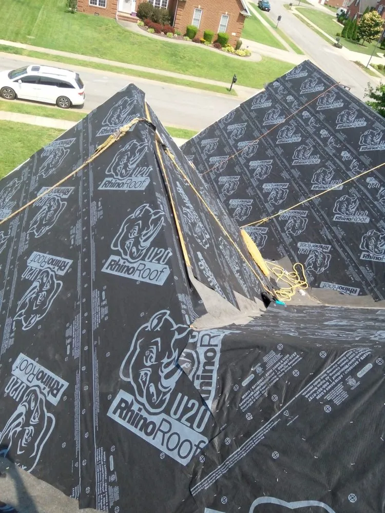 Slide of DC's Roofing and Contracting