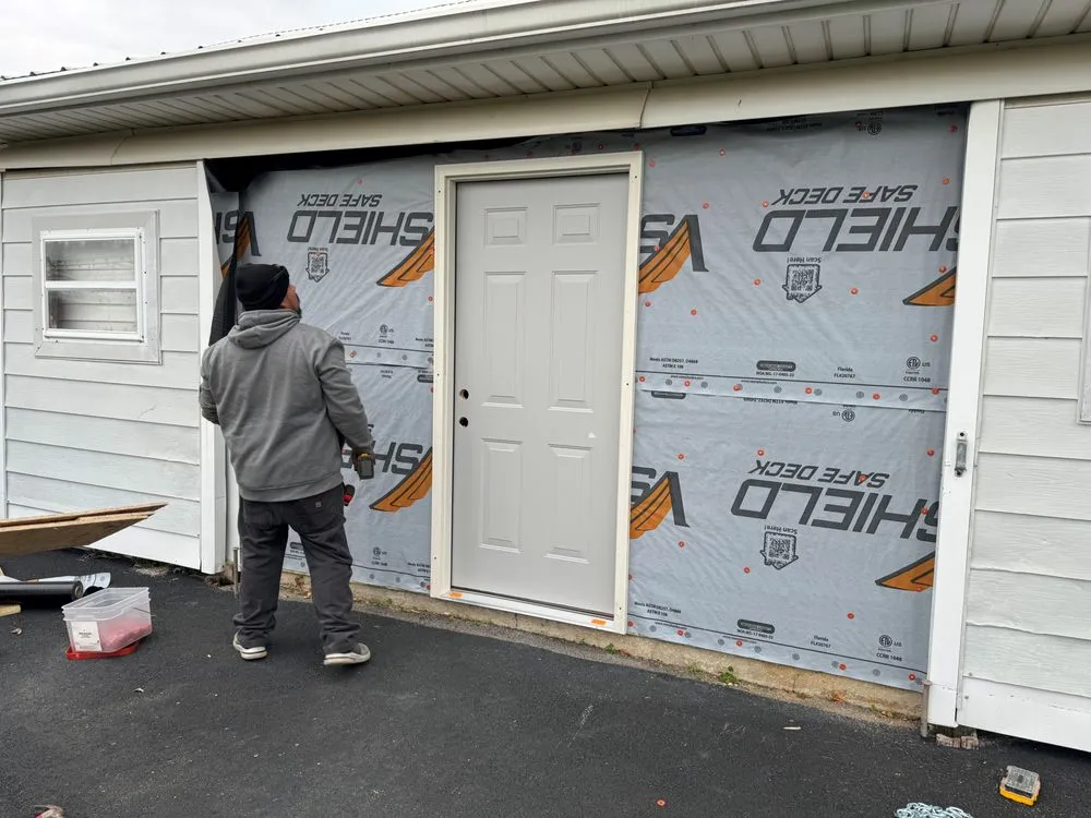 Slide of DC's Roofing and Contracting