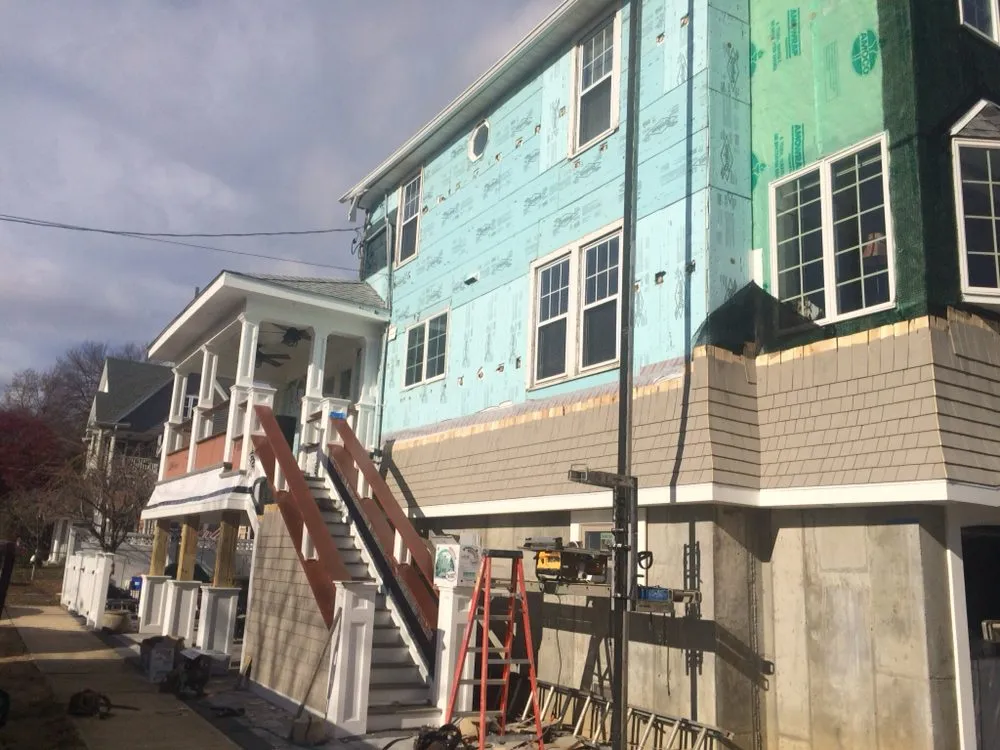 Slide of D&D Quality Siding