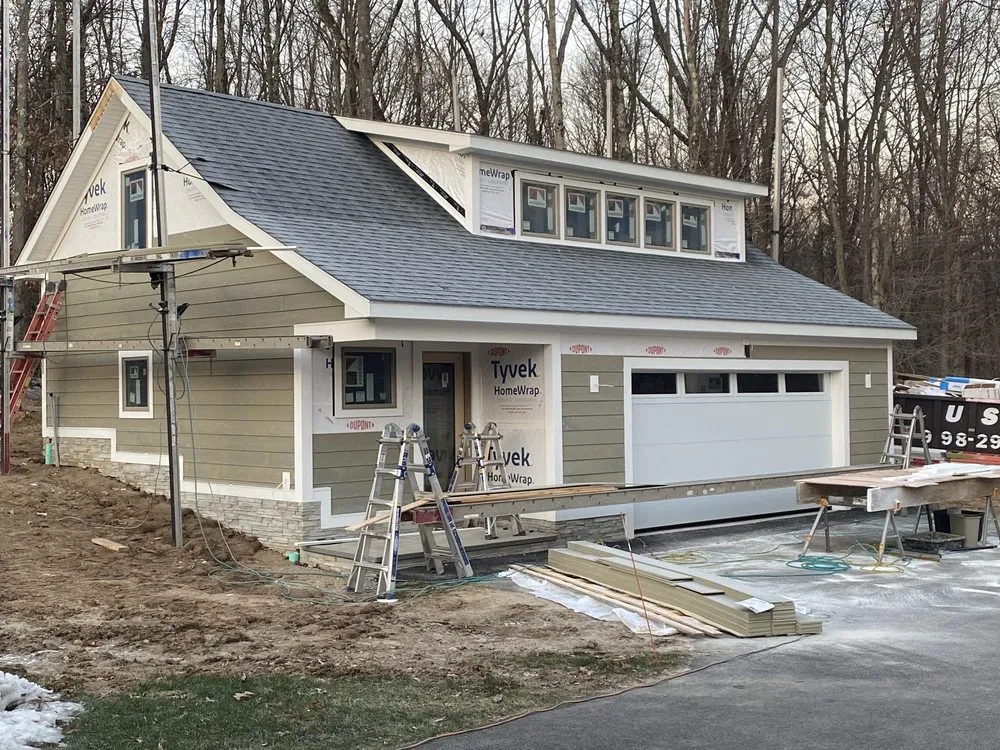 Slide of D&D Quality Siding