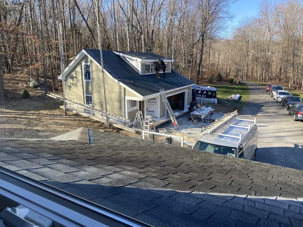 Slide of D&D Quality Siding