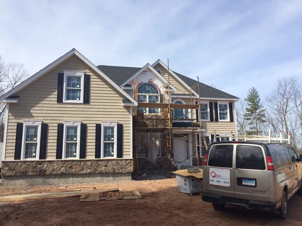 Slide of D&D Quality Siding