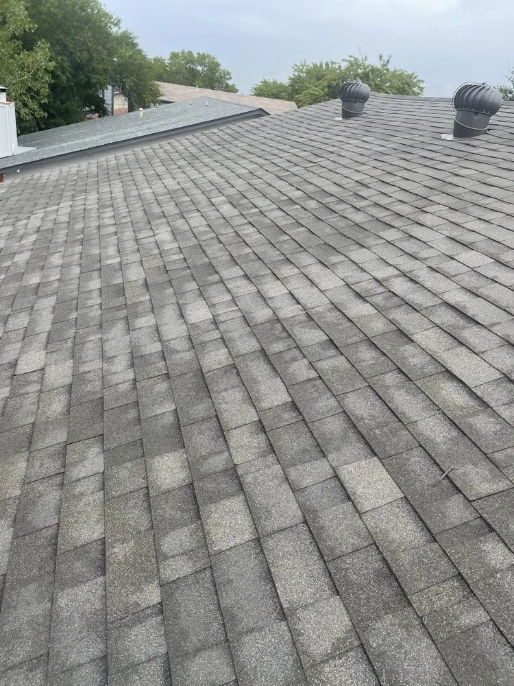 Slide of DE AL Roofing