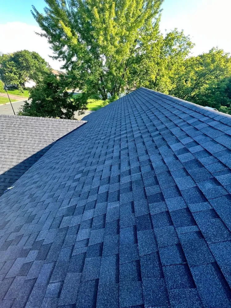 Slide of DE AL Roofing