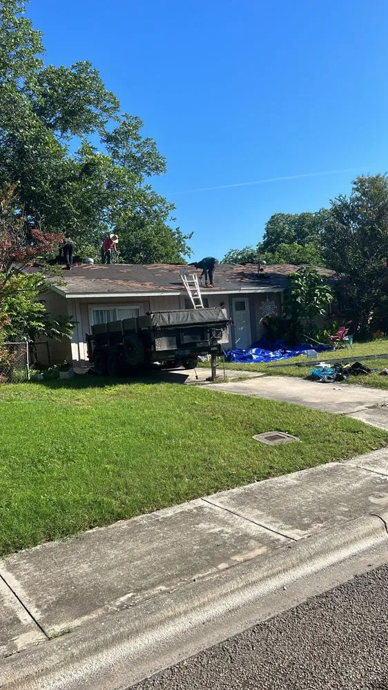 Slide of DE AL Roofing