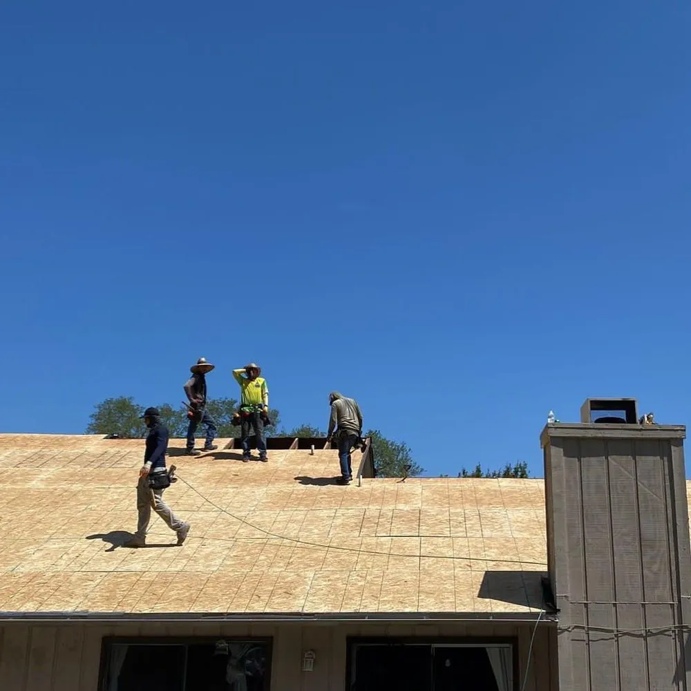 Slide of DE AL Roofing