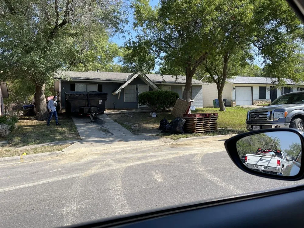 Slide of DE AL Roofing