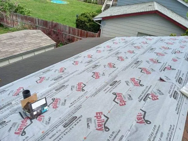 Slide of De Falco’s Roofing