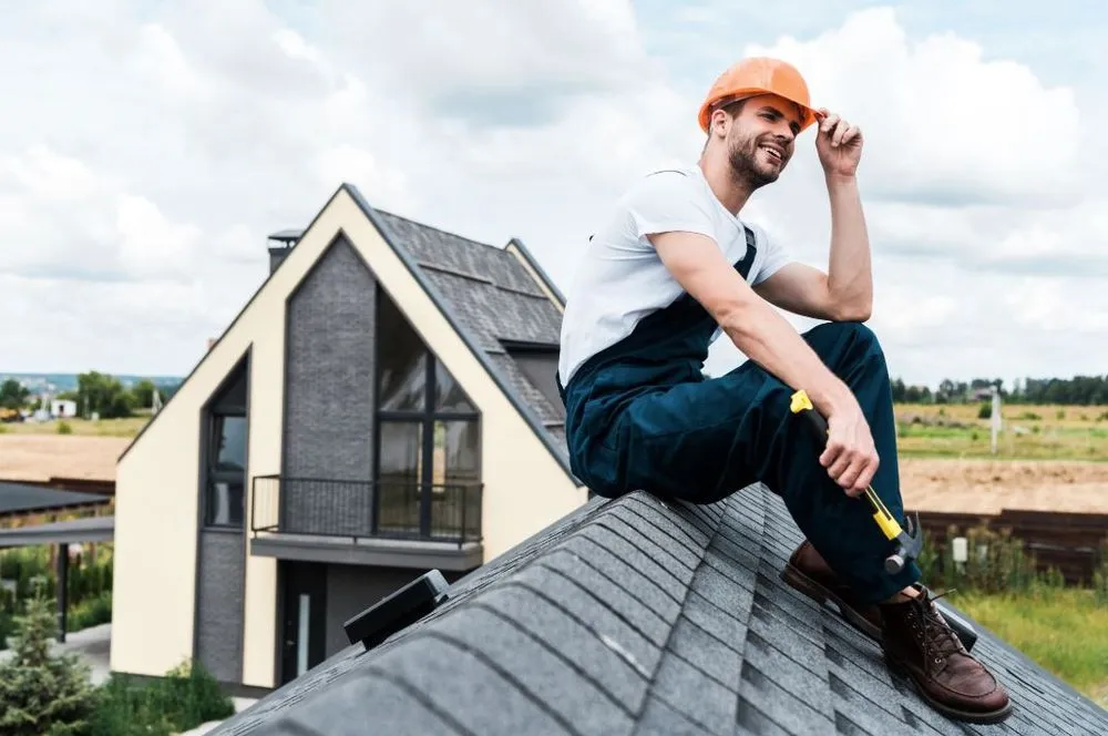 Slide of De La Cruz Roofing