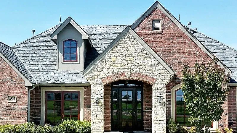 Slide of De La Cruz Roofing