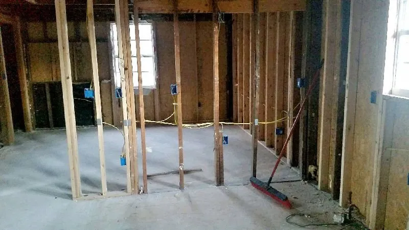 Slide of De La Cruz Roofing