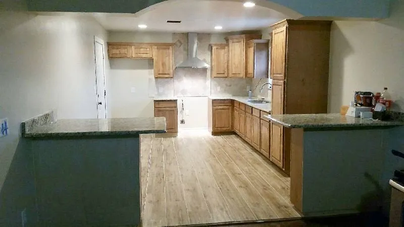 Slide of De La Cruz Roofing