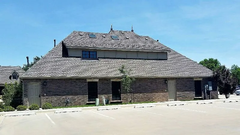 Slide of De La Cruz Roofing