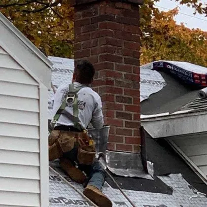 Slide of De La Rosa Roofing