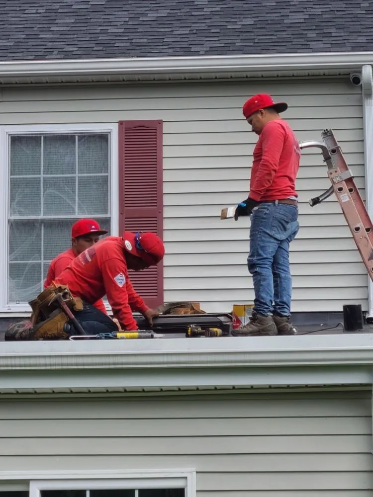 Slide of De La Rosa Roofing