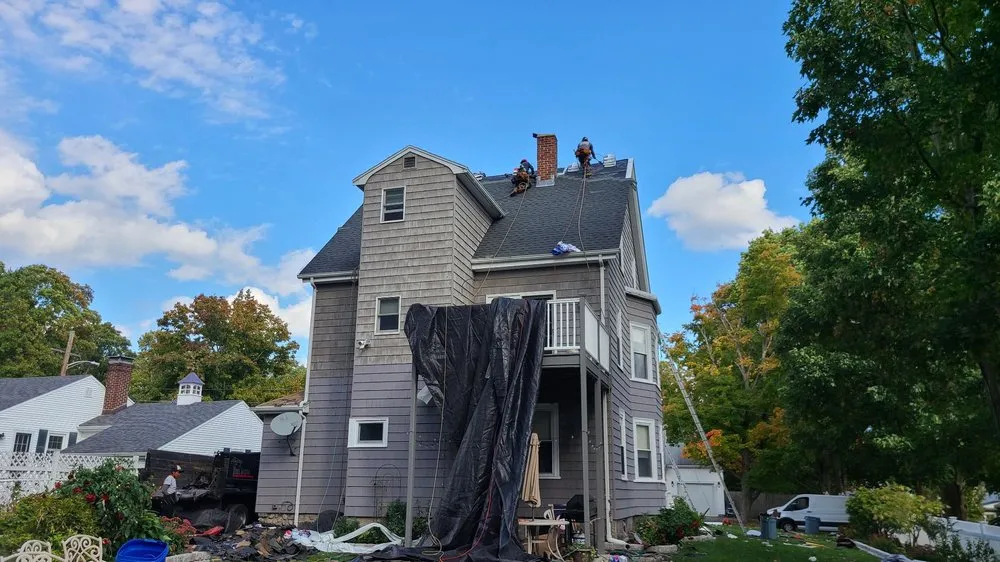 Slide of De La Rosa Roofing