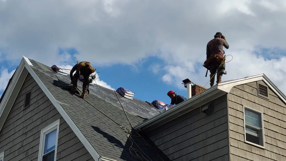 Slide of De La Rosa Roofing