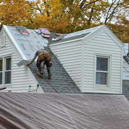 Slide of De La Rosa Roofing