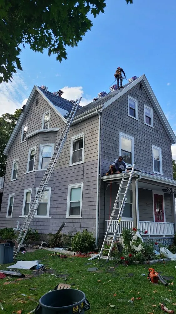Slide of De La Rosa Roofing