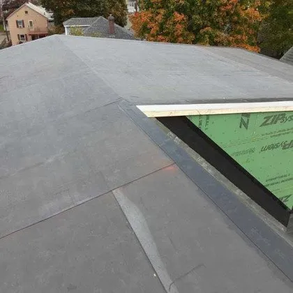 Slide of De La Rosa Roofing