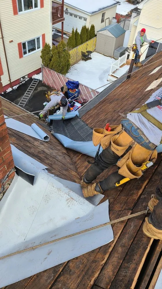 Slide of De La Rosa Roofing