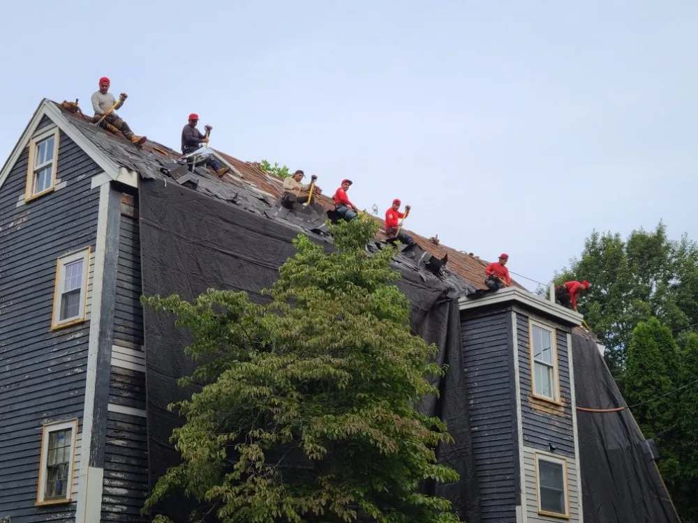 Slide of De La Rosa Roofing