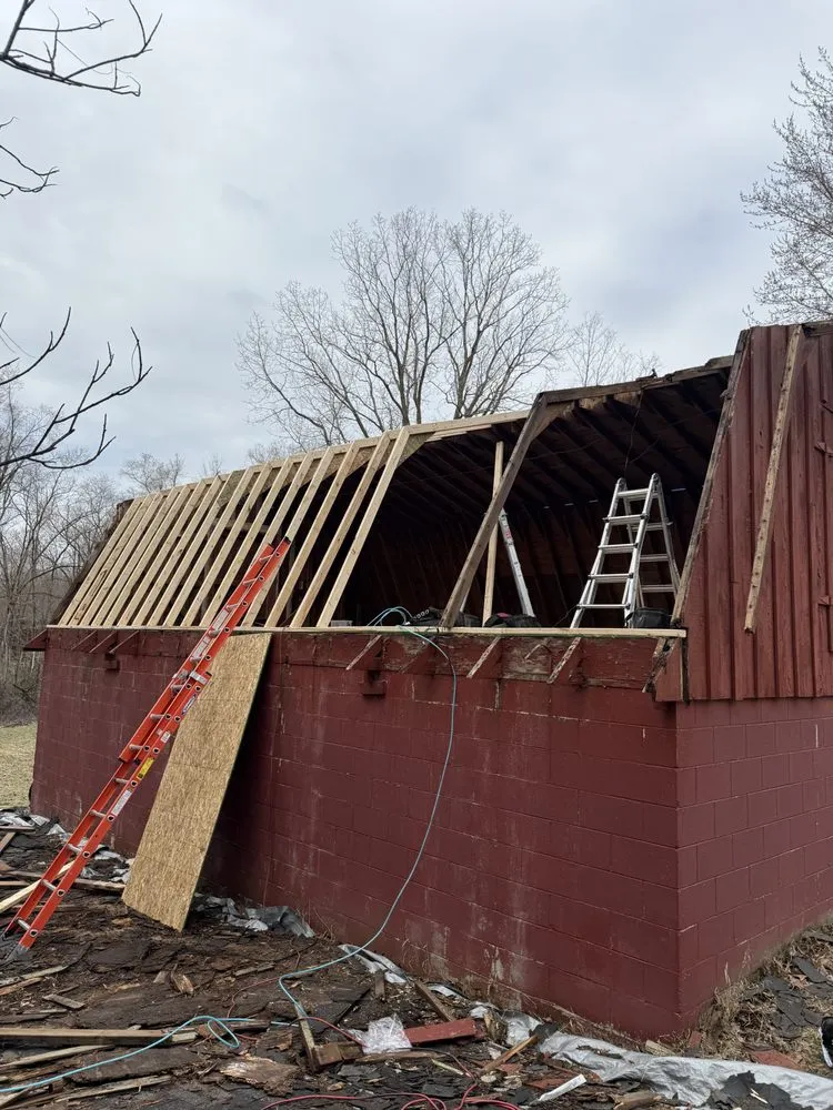 Slide of De Leon Roofing