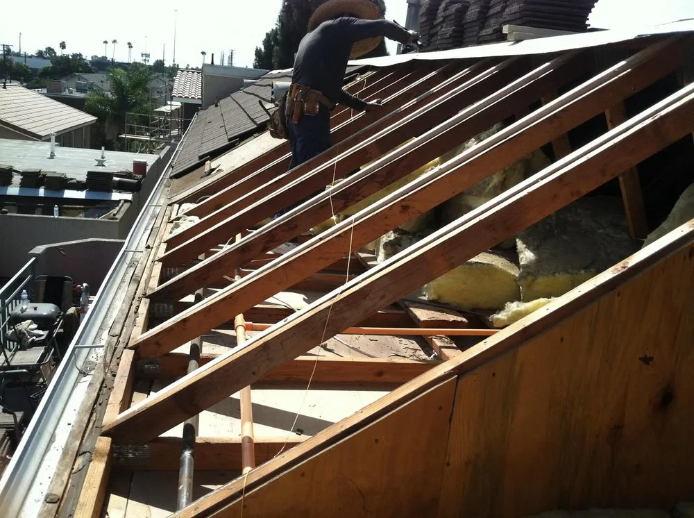 Slide of De Lorenzo's Guaranteed Roofing