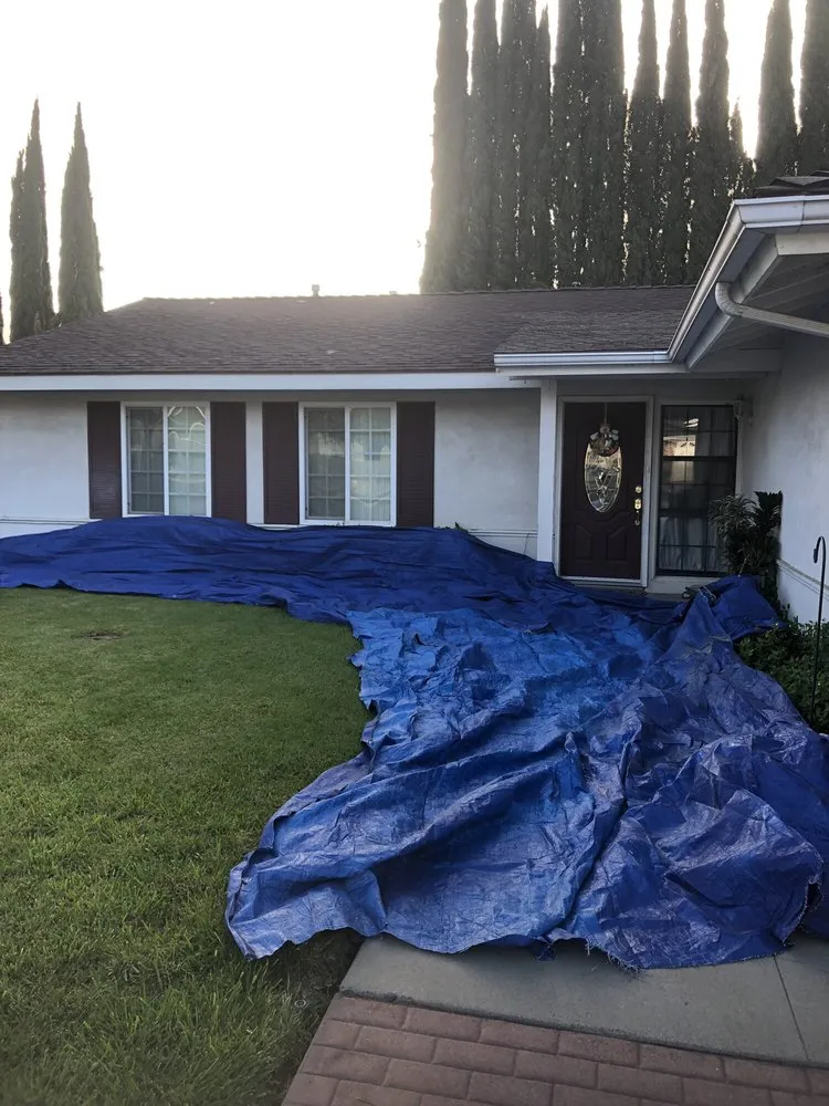 Slide of De Lorenzo's Guaranteed Roofing