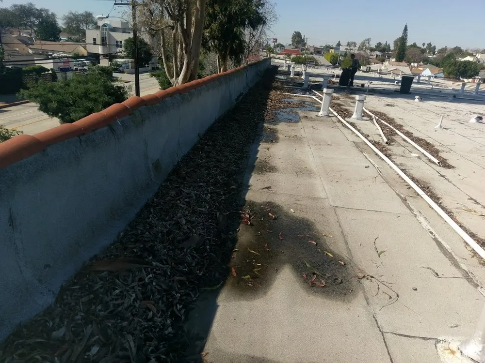 Slide of De Lorenzo's Guaranteed Roofing