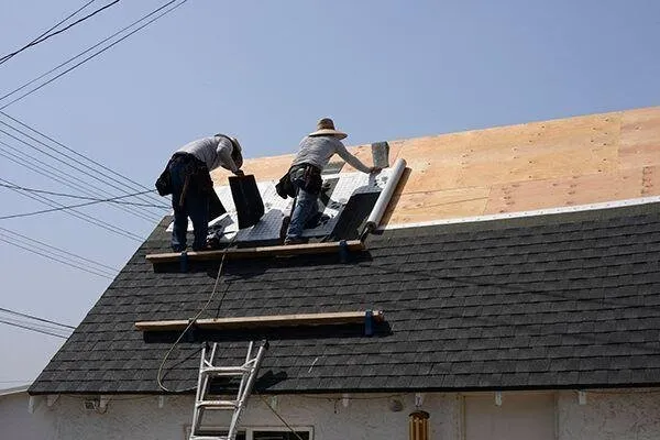 Slide of De Los Santos Roofing and Construction