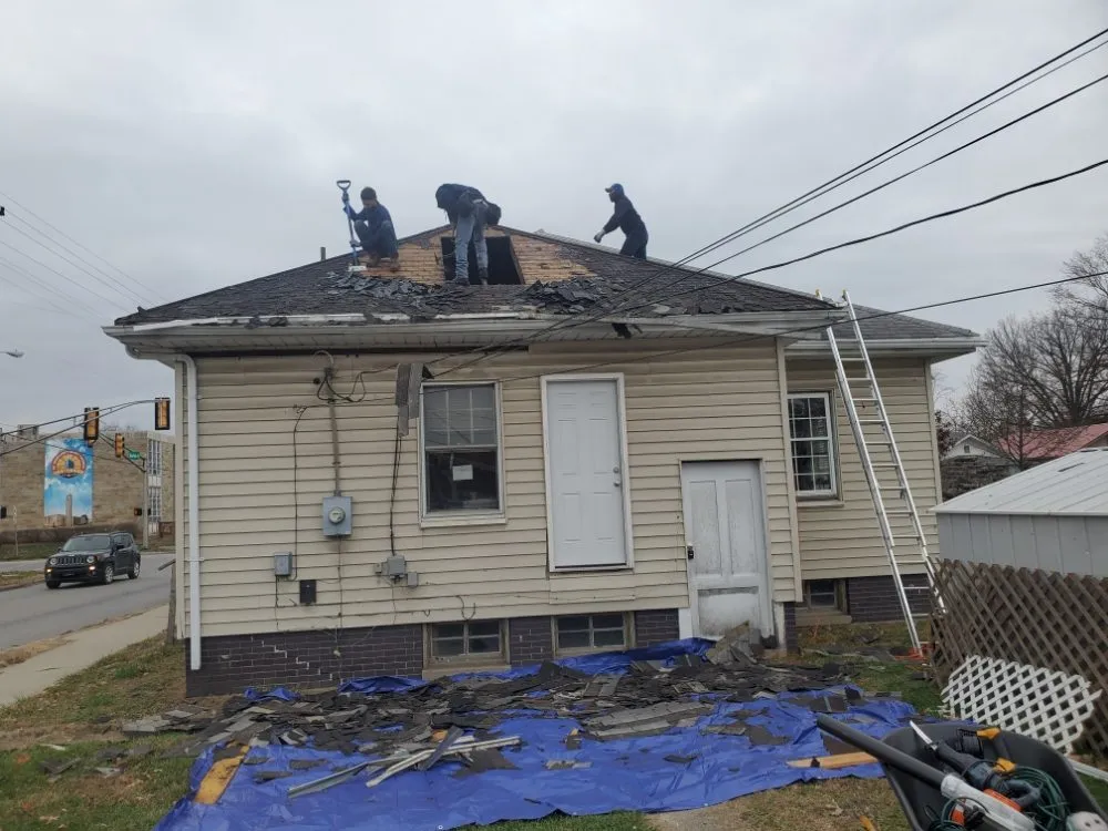 Slide of De Los Santos Roofing and Construction