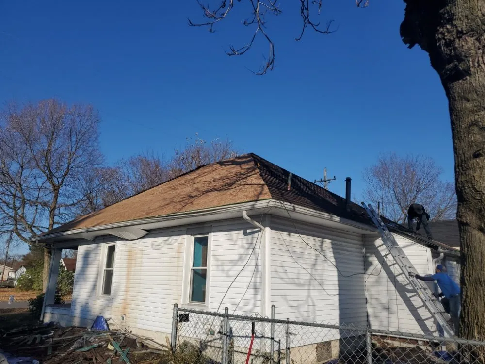 Slide of De Los Santos Roofing and Construction