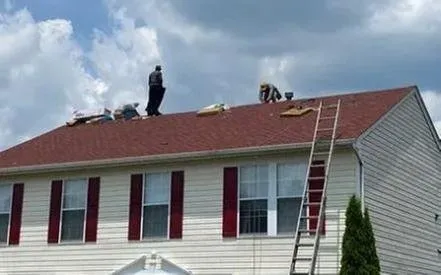 Slide of Dean Martin Roofing