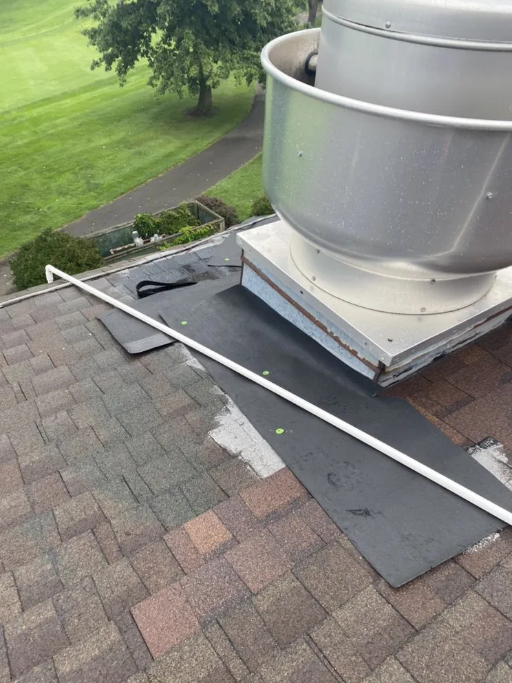 Slide of Dean Martin Roofing