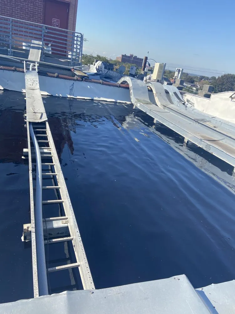 Slide of Deans Roofing and Paving