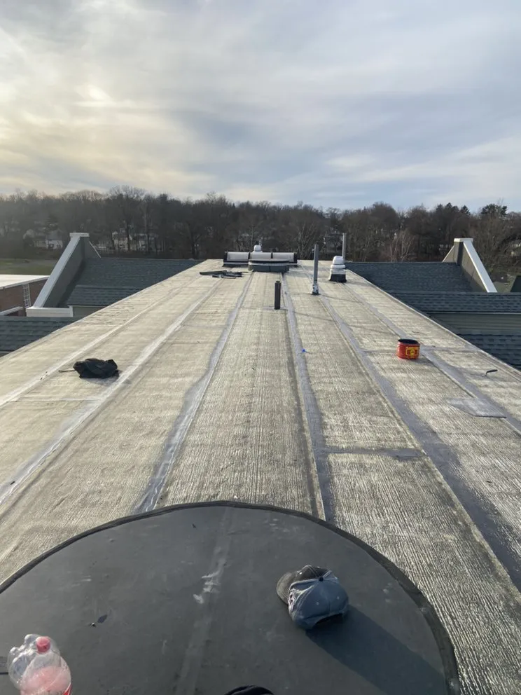 Slide of Deans Roofing and Paving