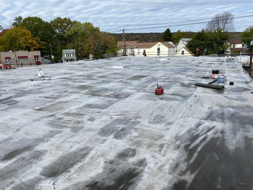 Slide of Deans Roofing and Paving