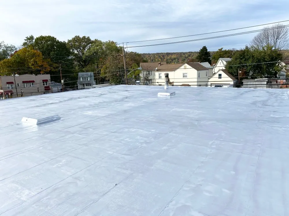 Slide of Deans Roofing and Paving