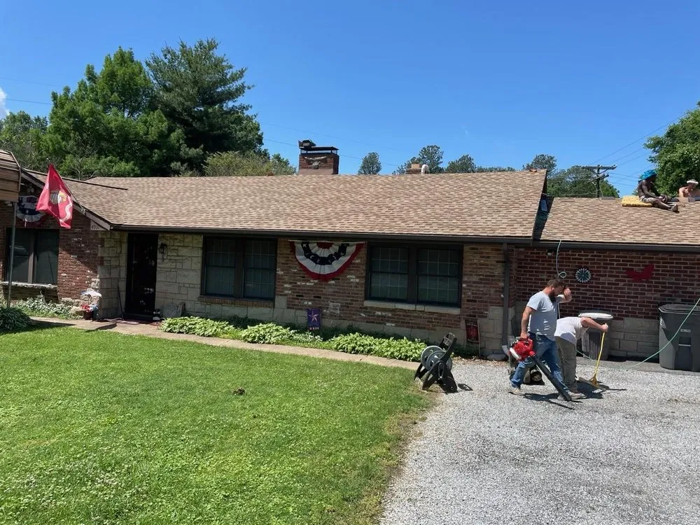 Slide of Deans Roofing