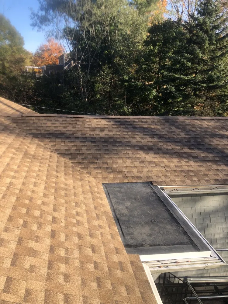 Slide of Decarney Roofing