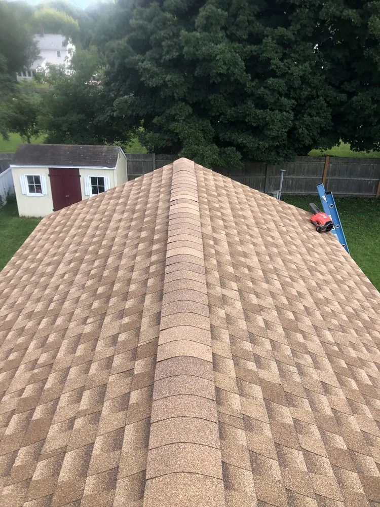 Slide of Decarney Roofing