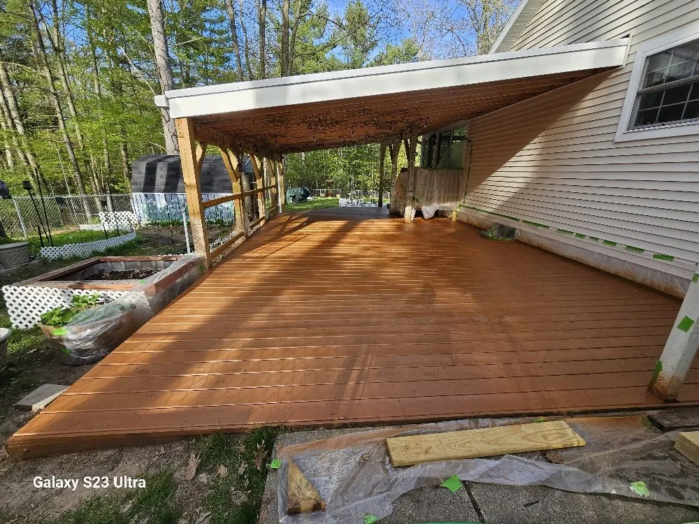 Professional shingle roofing service with free inspection across Morley, MI - Deck and Design by Wood