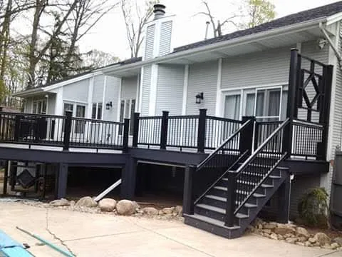 Professional roof leak repair in Morley, MI by Deck and Design by Wood