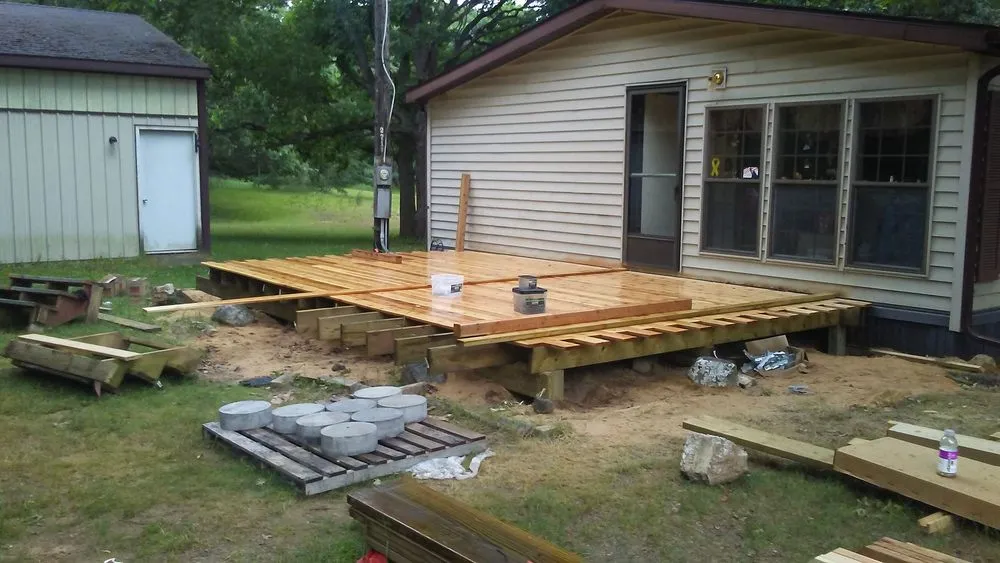 Professional roof replacement in Morley, MI by Deck and Design by Wood