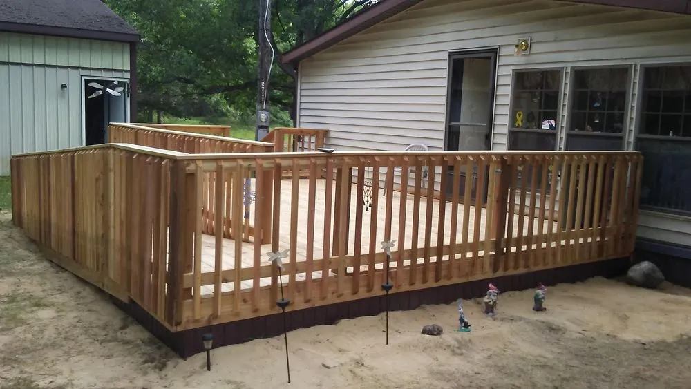 Top-rated storm damage roof repair near you across Morley, MI - Deck and Design by Wood