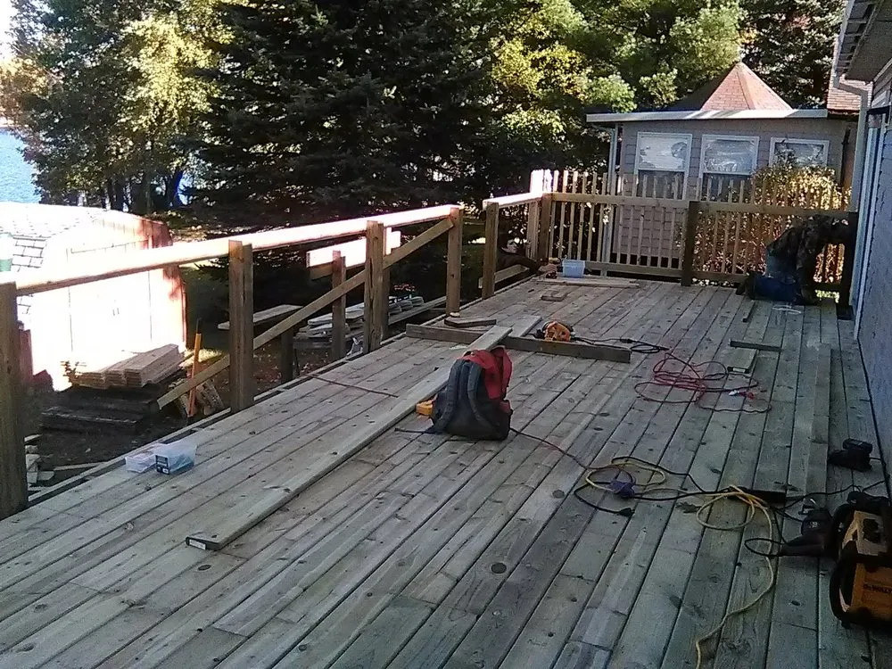 Emergency roof repair for fast service in Morley, MI by Deck and Design by Wood