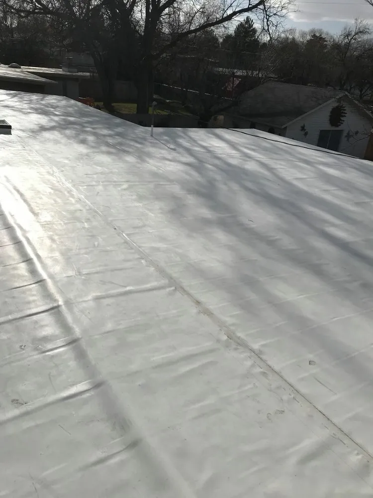 Slide of Dedication Roofing