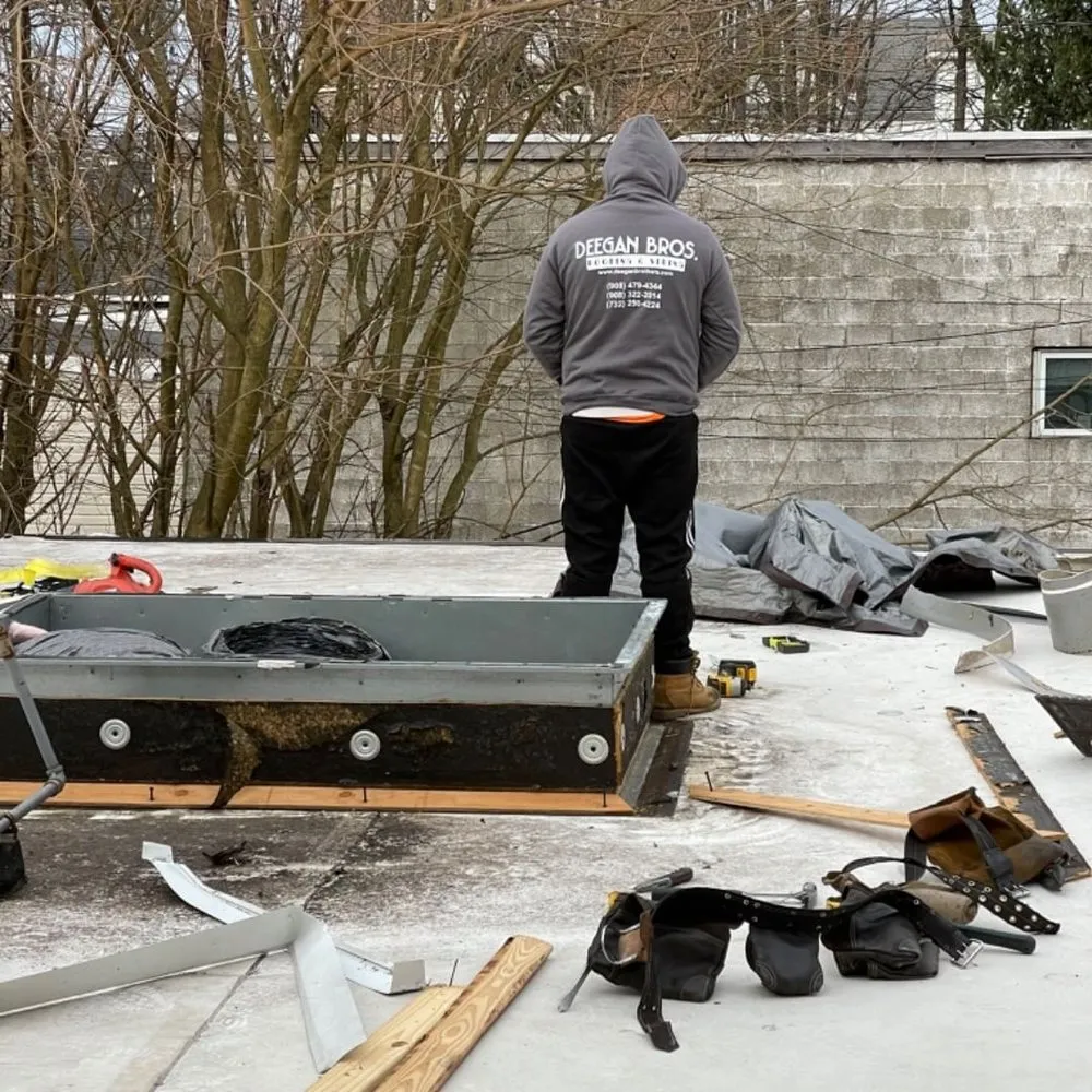 Slide of Deegan Brothers Roofing & Siding