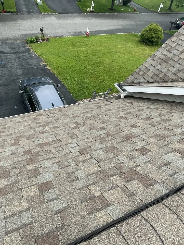 Slide of Deegan Roofing